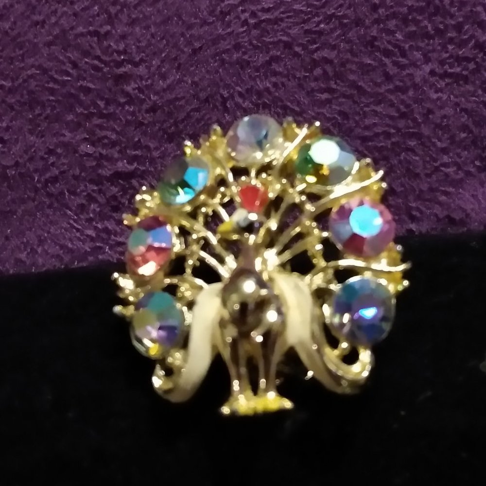 small Peacock pin with multi-colored crystals
